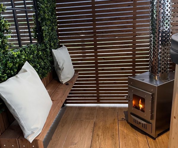 Wood - fired hot tub seating area